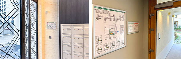 Plan d'intervention sous plexiglas installé dans un hall d'entrée d'immeuble